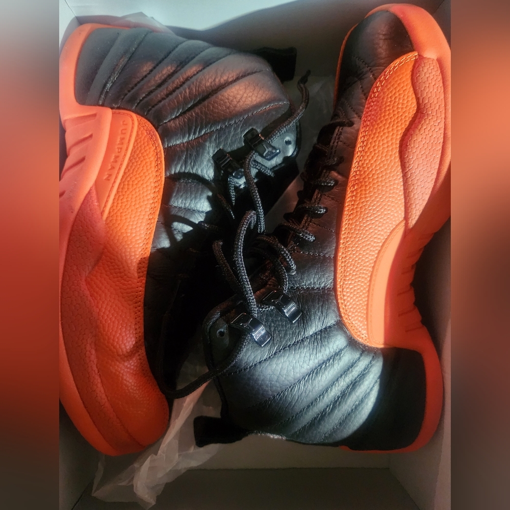 Like new Jordan 12's orange and blavk